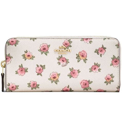 white coach wallet with flowers